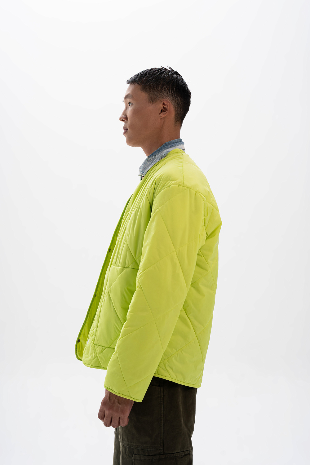 фото Стеганная куртка зеленая